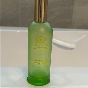 Tata Harper Green Glass Hydration Essence Bottle (product not included)